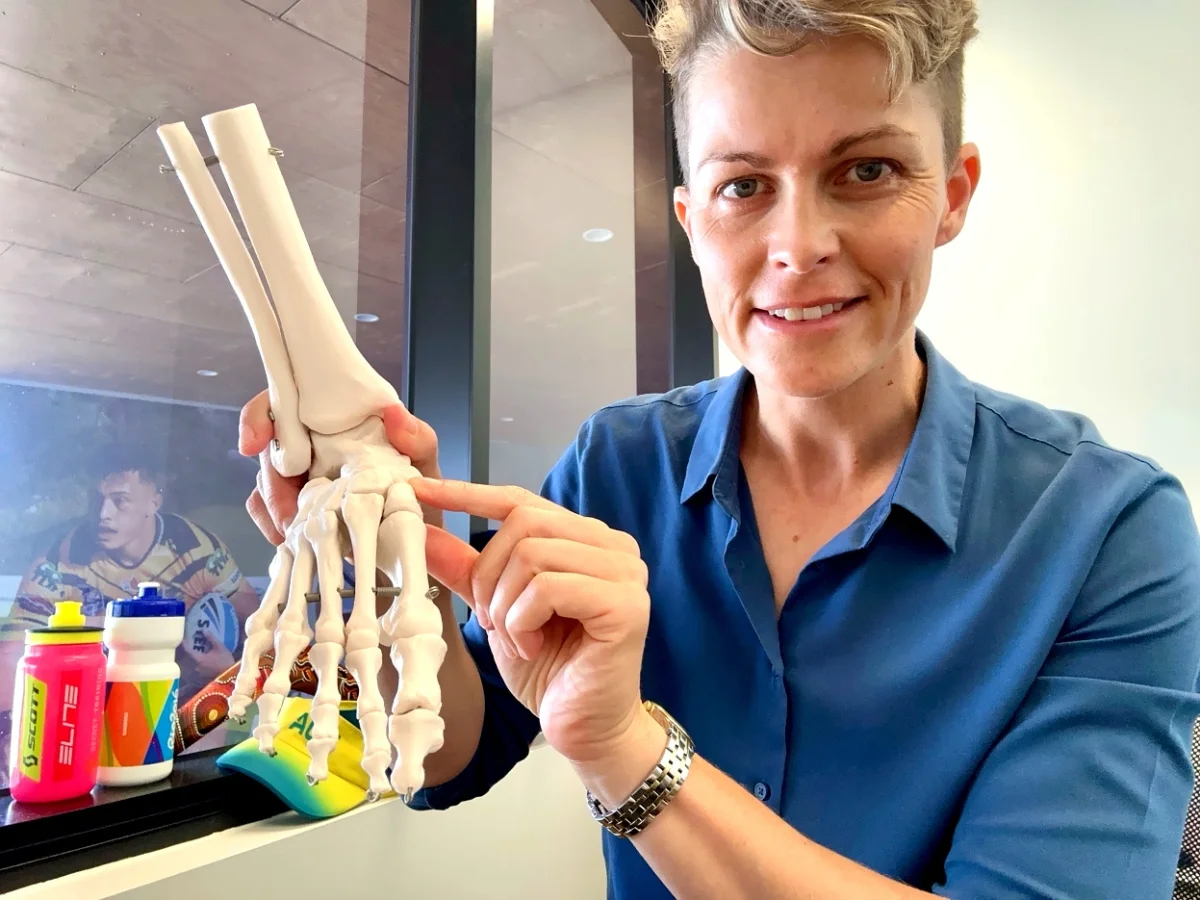 Dr Wells examining foot and ankle model